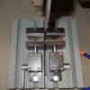 Cortadora-para-metalografia-da-Teclago-modelo-de-bancada-CM100-mesa-de-corte-e-morsas